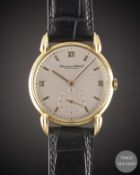 A GENTLEMAN'S 18K SOLID GOLD IWC WRIST WATCH CIRCA 1950s, WITH "CLAW" LUGS Movement: Manual wind,