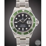 A GENTLEMAN'S STAINLESS STEEL ROLEX OYSTER PERPETUAL DATE "ANNIVERSARY" SUBMARINER BRACELET WATCH