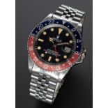 A GENTLEMAN'S STAINLESS STEEL ROLEX OYSTER PERPETUAL GMT MASTER BRACELET WATCH CIRCA 1973, REF. 1675