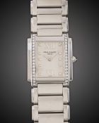 A LADIES STAINLESS STEEL & DIAMOND PATEK PHILIPPE TWENTY-4 BRACELET WATCH DATED 2006, REF. 4910/