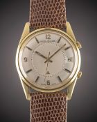 A GENTLEMAN'S 18K SOLID GOLD JAEGER LECOULTRE MEMOVOX ALARM WRIST WATCH CIRCA 1960s, REF. E11005