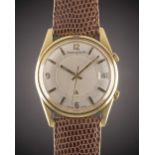 A GENTLEMAN'S 18K SOLID GOLD JAEGER LECOULTRE MEMOVOX ALARM WRIST WATCH CIRCA 1960s, REF. E11005