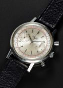A RARE GENTLEMAN'S LARGE SIZE STAINLESS STEEL LONGINES "WATERPROOF" FLYBACK CHRONOGRAPH WRIST
