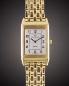 A FINE GENTLEMAN'S SIZE 18K SOLID YELLOW GOLD JAEGER LECOULTRE REVERSO BRACELET WATCH DATED 1995,