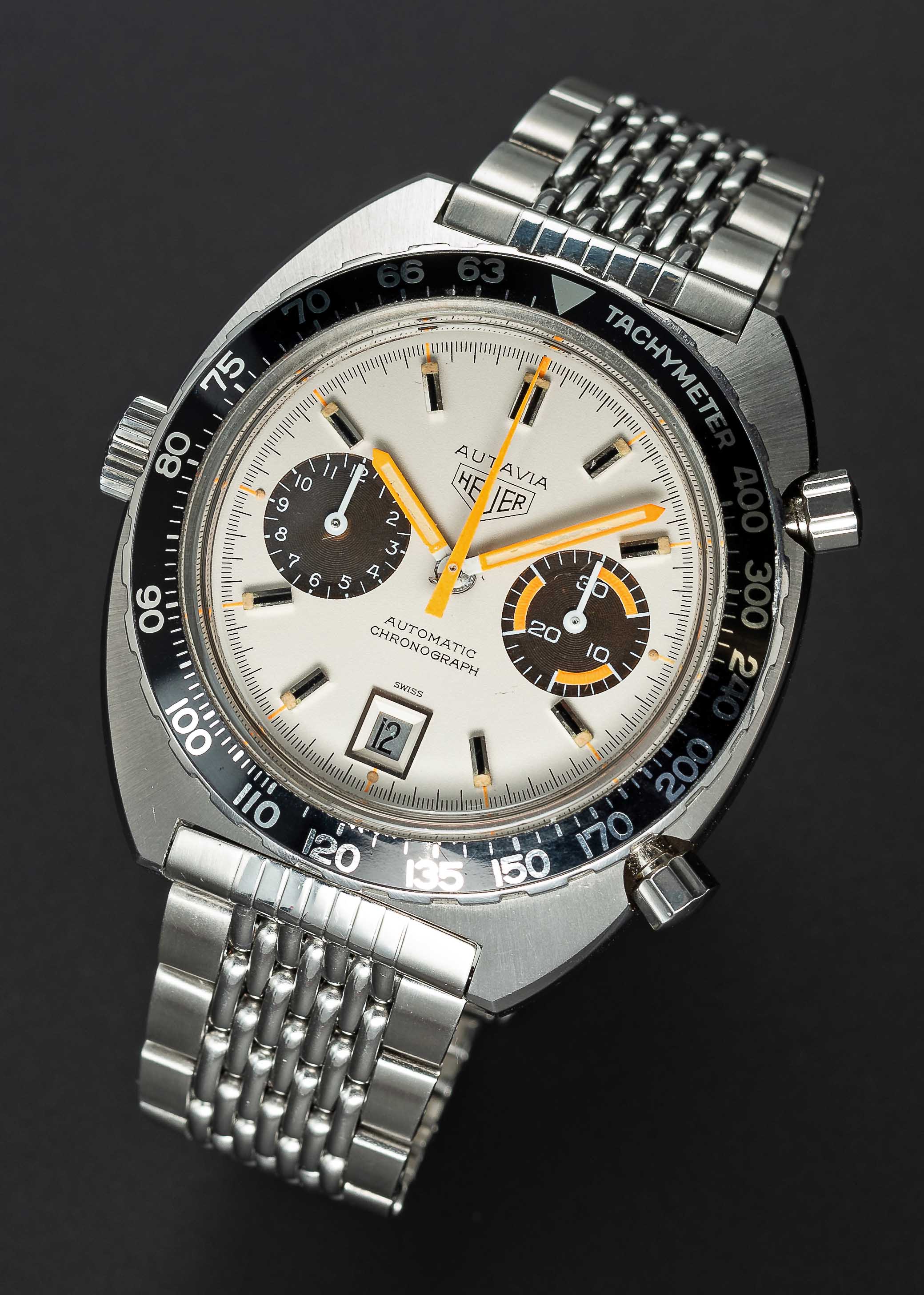 A RARE GENTLEMAN'S STAINLESS STEEL HEUER AUTAVIA "WHITE ORANGE BOY" AUTOMATIC CHRONOGRAPH BRACELET