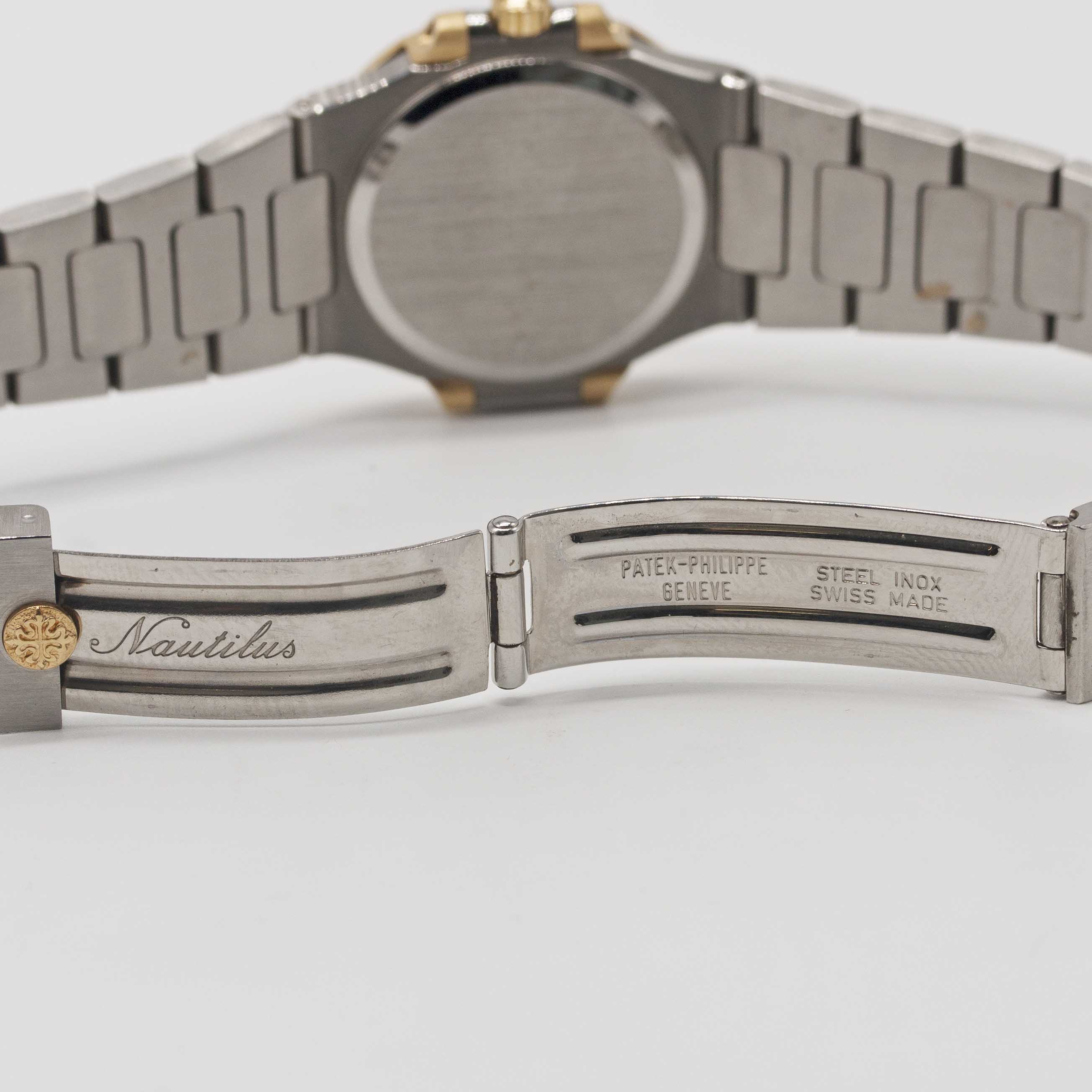 A RARE LADIES "NOS" STEEL & GOLD PATEK PHILIPPE NAUTILUS BRACELET WATCH CIRCA 1980s, REF. 4700/1 - Image 9 of 12