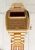 A RARE GENTLEMAN'S 18K SOLID YELLOW GOLD PULSAR TIME COMPUTER CALCULATOR LED BRACELET WATCH DATED