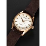 A RARE GENTLEMAN'S 18K SOLID ROSE GOLD ROLEX OYSTER PERPETUAL WRIST WATCH CIRCA 1955, REF. 6567