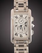 A GENTLEMAN'S 18K SOLID WHITE GOLD CARTIER TANK AMERICAINE CHRONOGRAPH BRACELET WATCH CIRCA 2000,