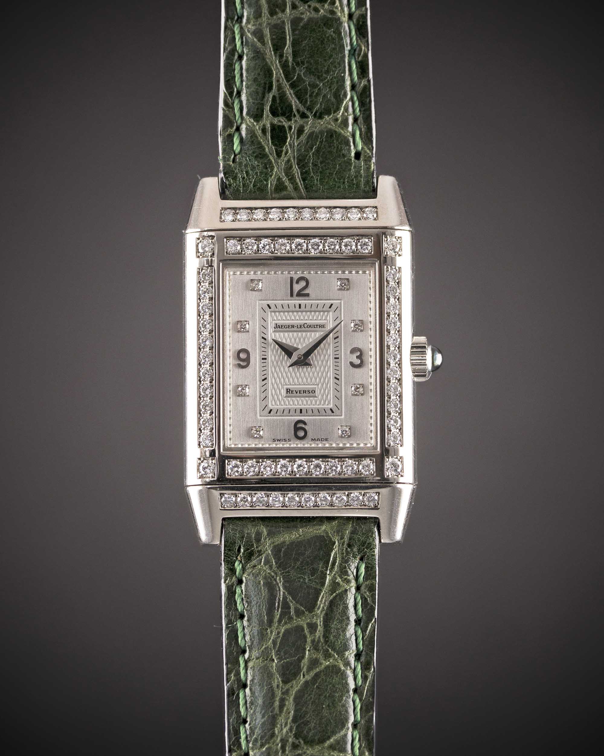 A FINE LADIES 18K SOLID WHITE GOLD & DIAMOND JAEGER LECOULTRE REVERSO WRIST WATCH DATED 1999, REF.