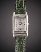 A FINE LADIES 18K SOLID WHITE GOLD & DIAMOND JAEGER LECOULTRE REVERSO WRIST WATCH DATED 1999, REF.