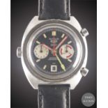 A GENTLEMAN'S STAINLESS STEEL HEUER AUTAVIA GMT AUTOMATIC CHRONOGRAPH WRIST WATCH CIRCA 1970s,