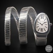 A LADIES STAINLESS STEEL BULGARI SERPENTI TUBOGAS DOUBLE SPIRAL BRACELET WATCH CIRCA 2010, WITH