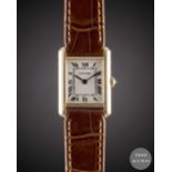 A LADIES 18K SOLID GOLD CARTIER TANK WRIST WATCH CIRCA 2000, REF. 1150 WITH CARTIER BOX & OPEN