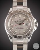 A GENTLEMAN'S STAINLESS STEEL & PLATINUM ROLEX OYSTER PERPETUAL DATE YACHT MASTER BRACELET WATCH