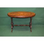 Victorian walnut oval stretcher table the top having moulded edge supported on turned and carved