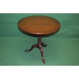 Mahogany circular tip to occasional table with bird cage movement,