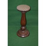 Mahogany stool having circular padded seat supported on a reeded bulbous column leading to a