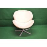 Mid century swivel egg style chair having padded suede upholstery,