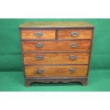 Georgian mahogany chest of drawers the top having moulded edge with rounded corners over two short