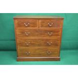 Mahogany cross banded chest of two short and three long graduated drawers with brass handles and