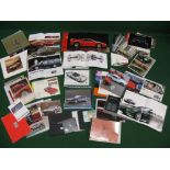 Quantity of car brochures for Ferrari, Fiat, Porsche, Daimler, Maserati, Mercedes, Bentley, BMW,