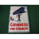 Guinness For Strength advertising paper poster featuring a man carrying girder on his head by