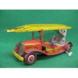 Clockwork tinplate fire engine with swivelling extending escape ladder and key (two firemen