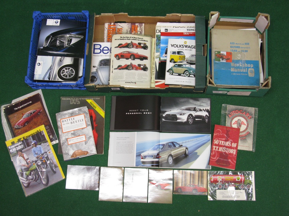 Three boxes of car brochures,