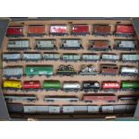 Thirty nine Hornby Dublo goods vehicles and guards van for LMS,