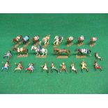 Twelve painted metal horses and riders marked Starlux on the base,