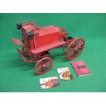 Part built metal and wood model of a Shand horse drawn fire engine with working hand brakes,