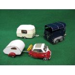 Metal and plastic models of a BMW Bubble car towing a sleeping pod,