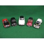 Five 1:18 scale diecast model cars to comprise: Volvo East African Rally Car, VW Beetle Cabriolet,