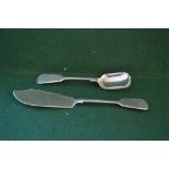 Large Victorian silver Fiddle pattern butter knife, marked for London 1883 and a sugar shovel,
