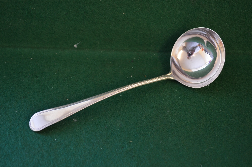 George III Old English and Feather Edge pattern silver sauce ladle,
