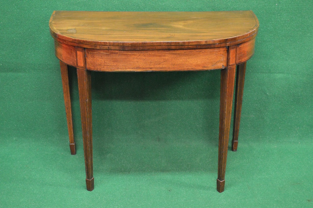 Georgian mahogany D shaped card table having cross banded top opening to reveal green baize playing