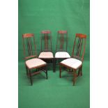 Liberty & Co, four Arts & Crafts Langley dining chairs with spindle back and stretcher detail,