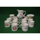 Set of ten Royal Worcester floral decorated coffee cans and saucers together with matching posy