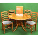 Late 20th century extending dining table having D shaped ends supported on a central bulbous column