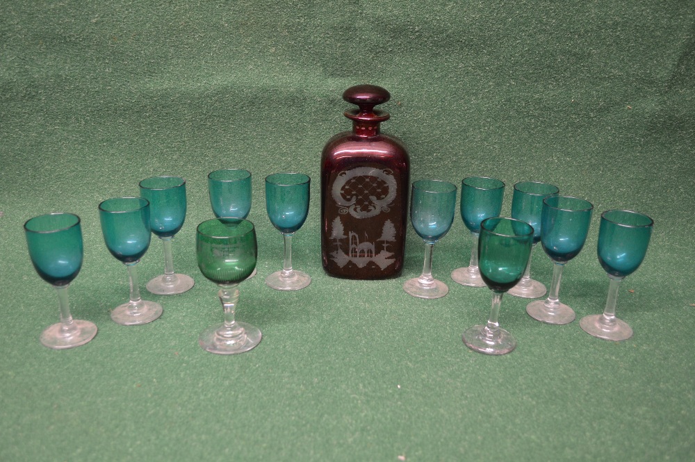 Group of coloured glassware to include: decanter and nine wine glasses