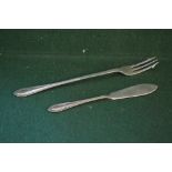 Long handled silver pickle fork and matching butter knife,