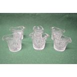 Set of six cut glass double spouted wine glass rinsers