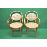 Pair of beech framed Dinette bentwood armchairs having scrolled arms with cane backs and seats,