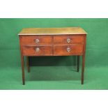 Mahogany chest of four short drawers with brass handles and escutcheons and cross banded top,