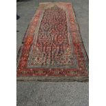 Large cream and black ground carpet having red, blue and pink pattern - 196" x 82.