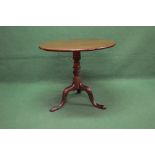 Circular mahogany tip top tripod occasional table supported on a turned column leading to three