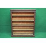 Mahogany bookcase the top having moulded edge over reeded sides supporting four adjustable shelves,
