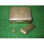 Silver cigarette box having engine turned decoration,