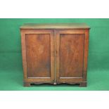 Victorian mahogany two door linen cupboard having two panelled doors opening to reveal four